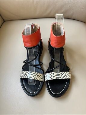 IXOS Black leather Sandals with Red Ankle Cuff and Leopard-Print Toe Strap